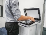 Paper Tiger Scanning Documents and then shredding